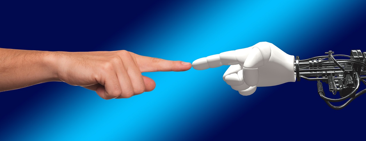 Human finger pointing to an AI finger